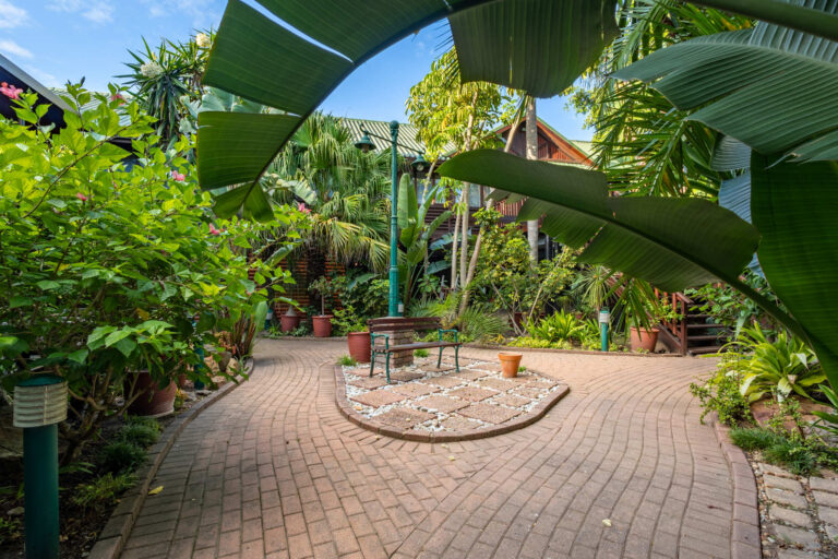 The Graywood Wing Gardens and Pool Area